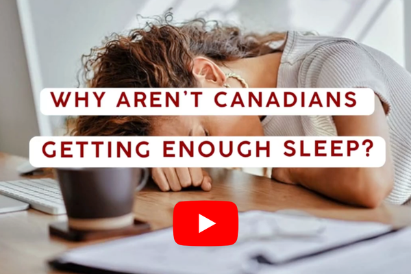 Title page for YouTube video with women head down asleep on a desk background labelled Why aren't Canadians getting enough sleep