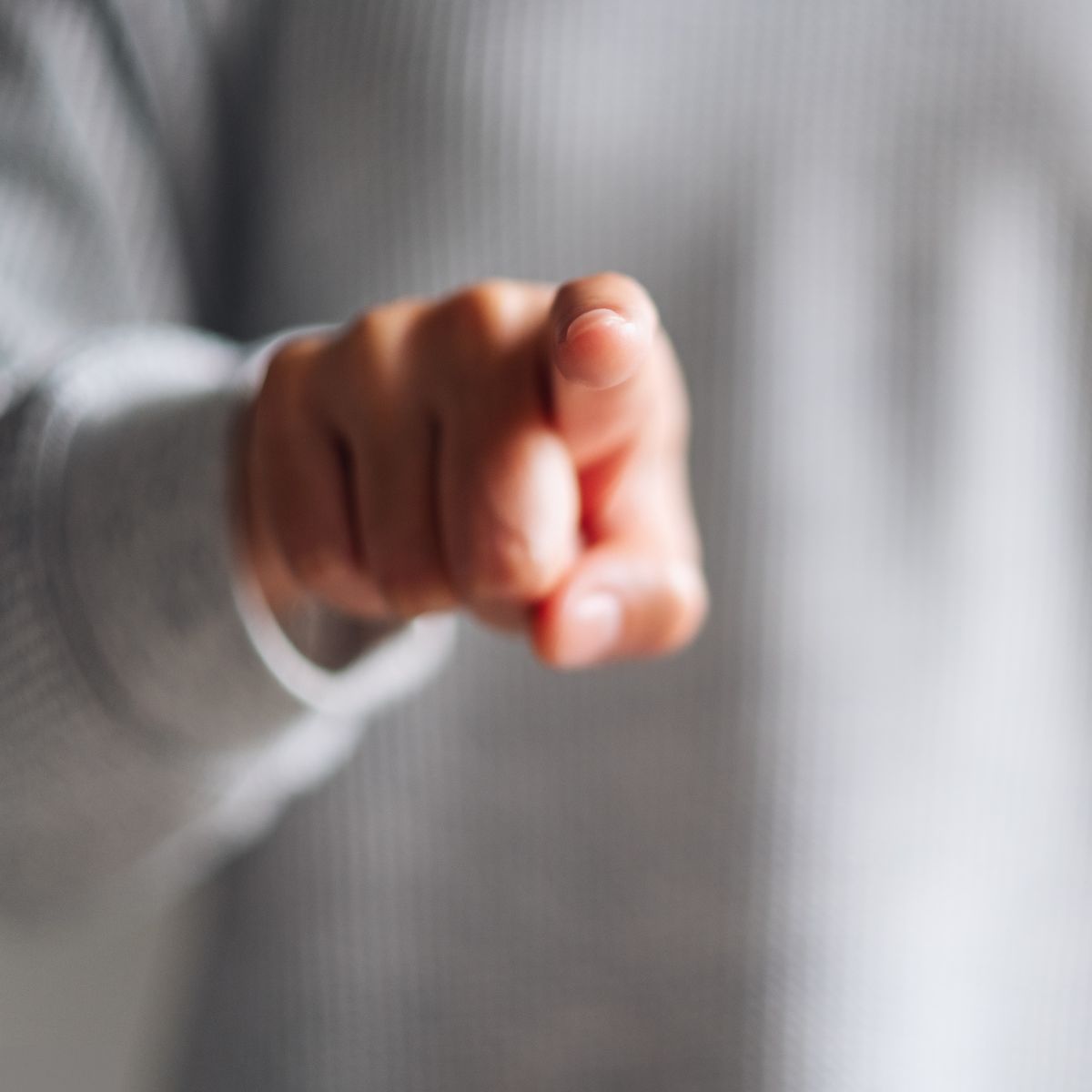 Hand pointing at you